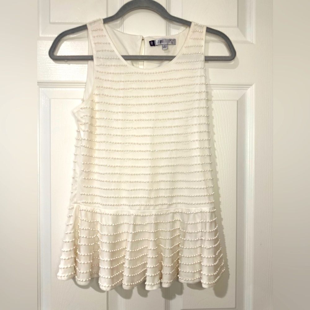 Beautiful pearl white Peplum beaded top